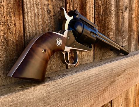 75in Case Hardened & Blued Black Composite Double Eagle. . Grips for a single action revolver